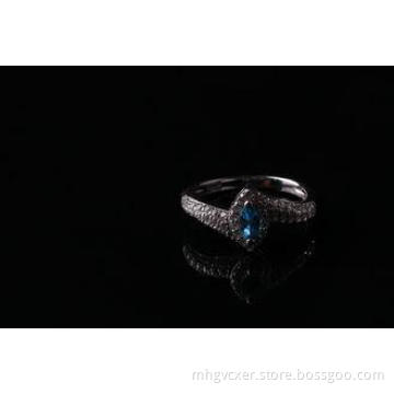 Rho plated Silver CZ Rings with marquise blue stone wedding